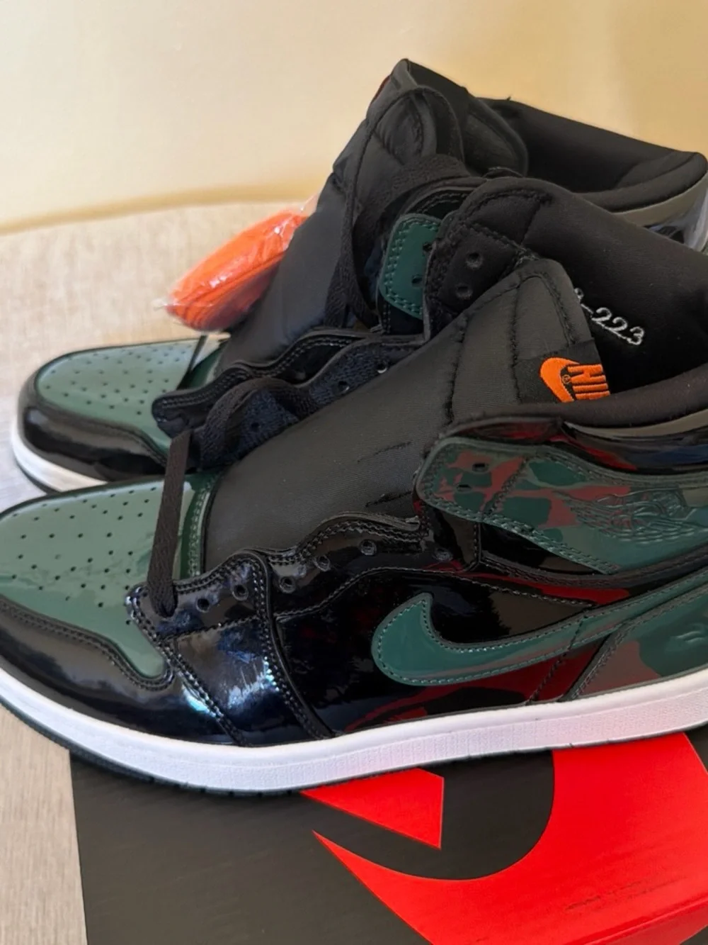 Jordan High-Top Sneakers in Black, Green & Orange